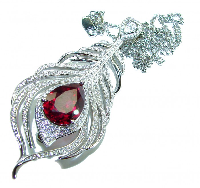 Authentic 12.5 carat faceted Australian Garnet .925 Sterling Silver handcrafted necklace pendant brooch - Peacock feather pendant with garnet, top view, sterling silver chain.