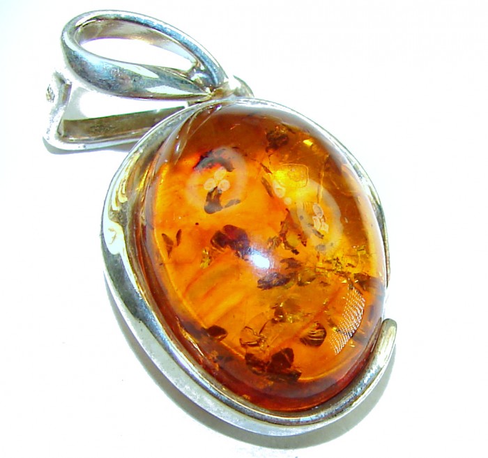 Prehistoric Authentic Baltic Amber .925 Sterling Silver beautifully handcrafted Pendant - Close-up of amber pendant with .925 sterling silver setting.