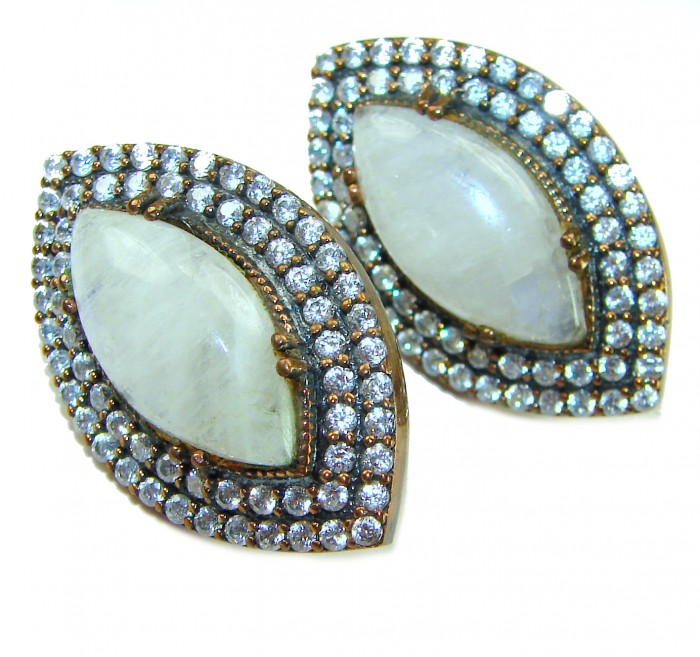 Cascades OF LIGHT Genuine 15.2 carat Fire Moonstone .925 Silver handcrafted earrings - Moonstone earrings close-up showcasing stones and detailed setting.