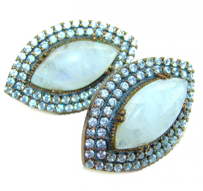 Cascades OF LIGHT Genuine 15.2 carat Fire Moonstone .925 Silver handcrafted earrings - Close-up of Cascades OF LIGHT moonstone earrings with gemstone detailing.