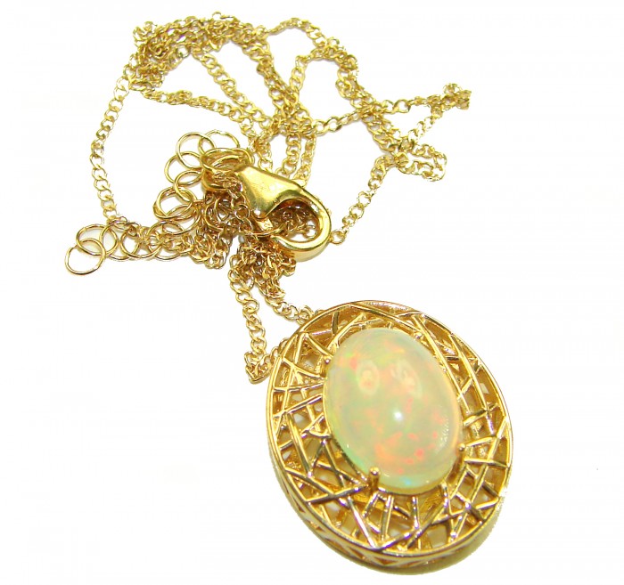 Earth Treasure Authentic 16.8 carat Golden Ethiopian Opal 22K Gold over .925 Sterling Silver handcrafted Statament Necklace - Golden opal pendant with chain and clasp detail, top view.