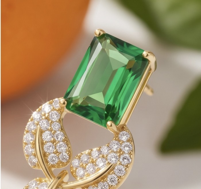 Luxurious 10.9 carat authentic Himalayan Peridot .925 Sterling Silver dipped in 14K Gold Handcrafted Statement Earrings - Close-up of gold and diamond-set Himalayan peridot earring.