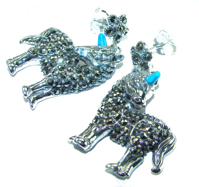 My sweet Unicorns Marcasite .925 Sterling Silver handmade Earrings - Pair of unicorn earrings, marcasite detail, angled top view.