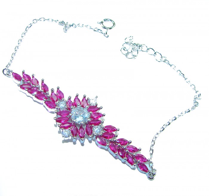 Tiffany - Luxurious natural 26.5 carat Ruby .925 Sterling Silver Statement Bracelet - Tiffany ruby bracelet on white background, top view showcasing clasp.