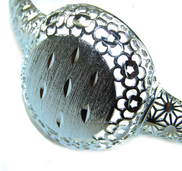 Casablanca Italy made .925 Sterling Silver Bracelet - Close-up of detailed floral design on a sterling silver bracelet.