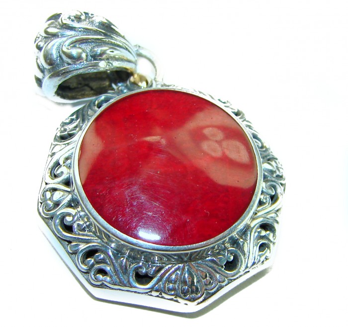 Bright Energy Authentic Coral .925 Sterling Silver Bali handmade pendant - Close-up of coral pendant in ornate sterling silver setting.