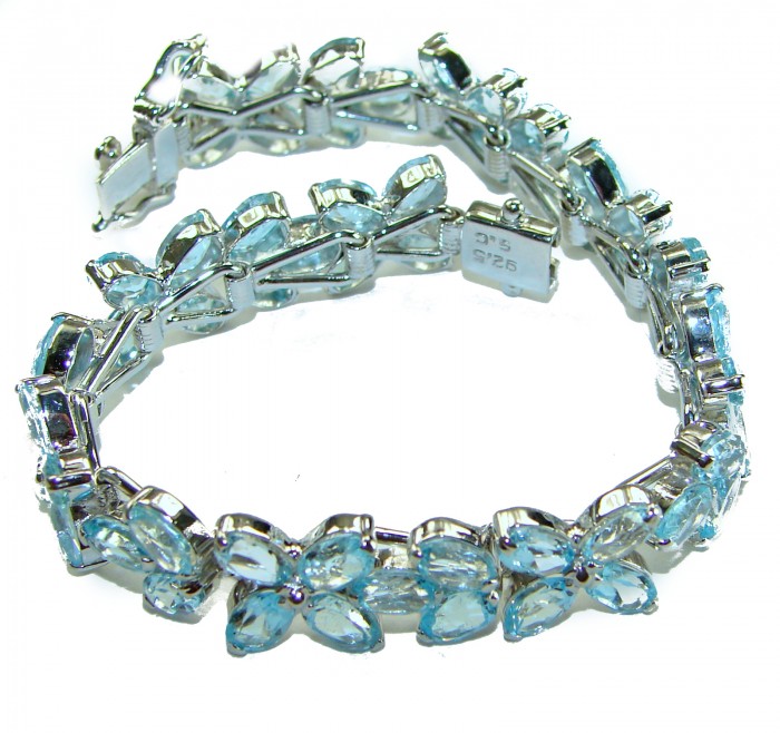 Spectacular 62.5 carat authentic Swiss Blue Topaz .925 Sterling Silver handmade Bracelet - Swiss Blue Topaz bracelet, overhead view showing floral design.