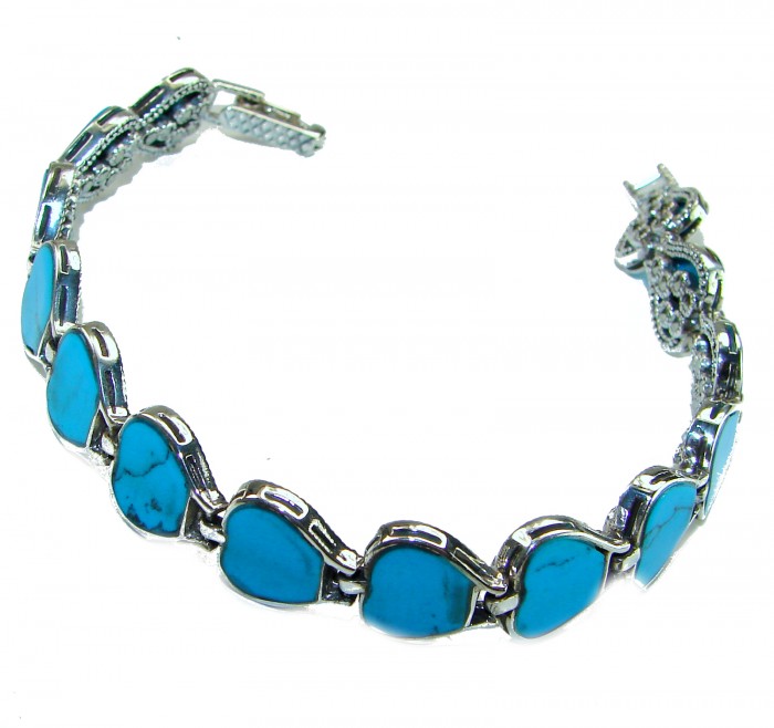 Fantastic inlay Turquoise Marcasite .925 Silver handmade double-sided Bracelet - Turquoise and silver bracelet, side view, showcasing inlay design.