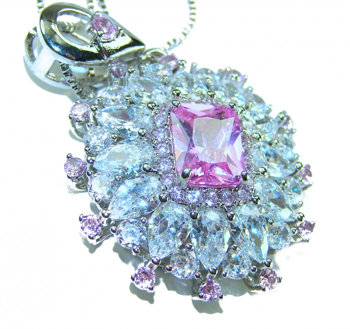 SPECTACULAR- Outstanding quality - 27.5 carat Pink Topaz .925 Sterling Silver handcrafted Statement necklace - Close-up of ornate pendant with pink topaz and surrounding gemstones.