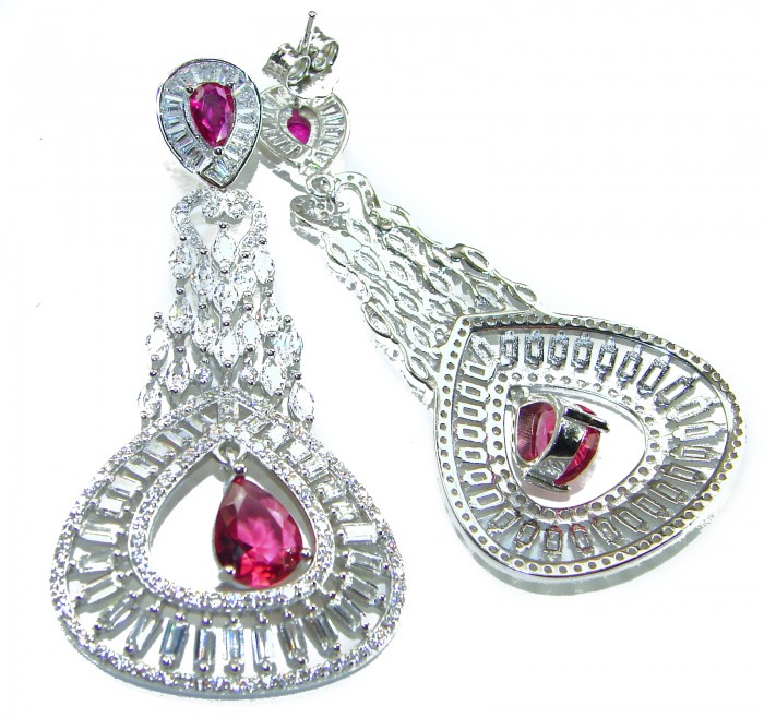 Pure Luxury 22.2 carat natural Ruby .925 Sterling Silver handmade Statement earrings - Close-up of dangling ruby earrings in sterling silver.