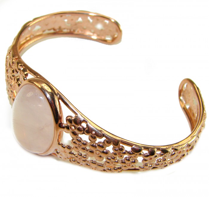 Vintage Beauty Genuine 20.5 carat Brazilian Rose Quartz Rose quartz 18K Gold over .925 Sterling Silver handcrafted Bracelet / Cuff - Rose gold cuff with floral design and rose quartz, side view.
