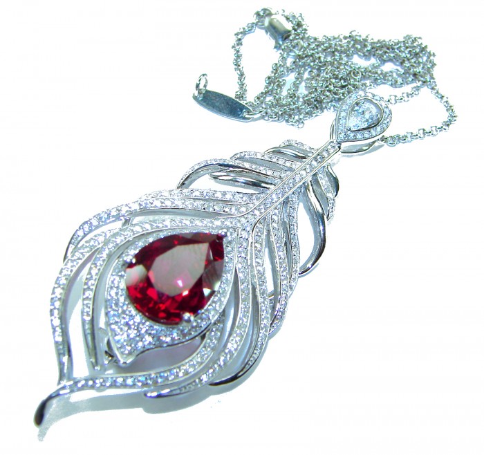 Magic Feather 10.2 carat Ruby .925 Sterling Silver .925 Sterling Silver Statement Necklace - Close-up of a feather-shaped pendant with ruby and silver details.