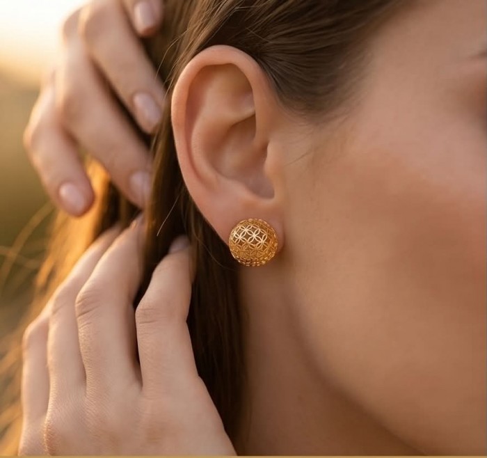 Black Label Collection - Dubai Style - Natural 22K Gold over .925 Sterling Silver handmade earrings - Side view of 22K gold earrings worn on ear, intricate pattern visible.
