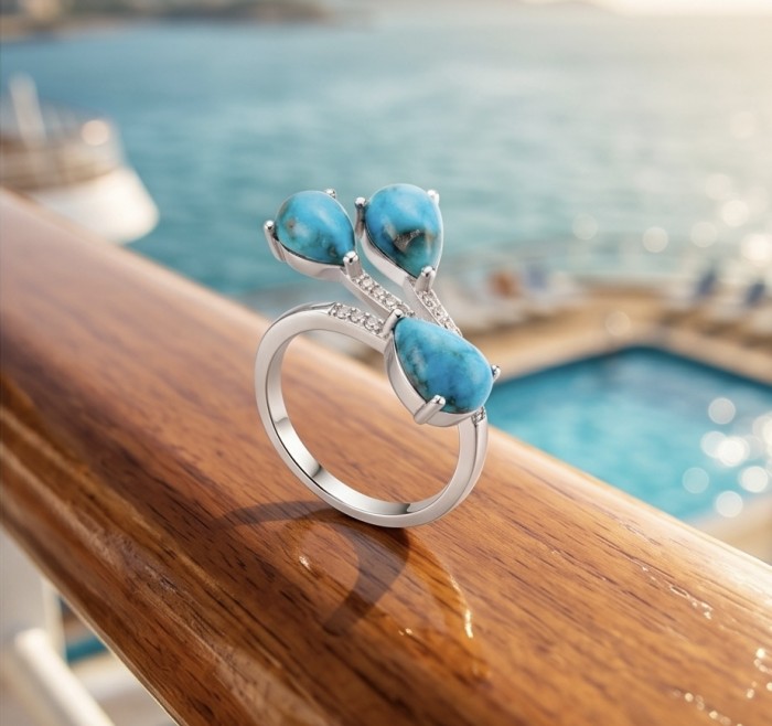 Rare Stone Of Harmony - Parrots Wing Chrysocolla .925 Sterling Silver ring s. 7 1/4 - Side view of Rare Stone Of Harmony ring on a cruise railing