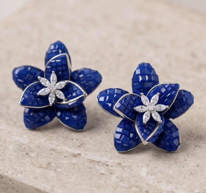 Born to Glam authentic mystery setting 18.2 carat Colombian Sapphire .925 Sterling Silver handcrafted earrings - Front view of floral blue gemstone earrings with diamond accents.