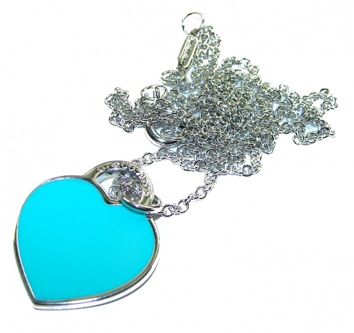 Angel's Heart inlay Turquoise .925 Sterling Silver handcrafted necklace - Heart-shaped turquoise pendant with silver chain, top view.
