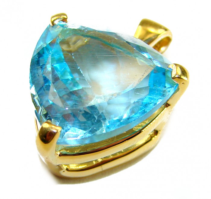 Atlantica TRILLION cut 12.9 carat Swiss Blue Topaz 18K Gold over .925 Sterling Silver Handcrafted Pendant - Close-up of Swiss Blue Topaz in 18K gold setting, front angle.