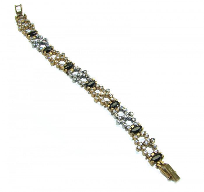 Gabriella 22.2 carat authentic Sapphire rhodium over .925 Sterling Silver handcrafted Statement Bracelet - Bracelet top view, showcasing sapphires and intricate design.