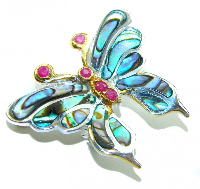 BUTTERFLY Natural Rainbow Abalone .925 Sterling Silver handmade Pendant - Butterfly brooch with abalone and pink stones, top view close-up.
