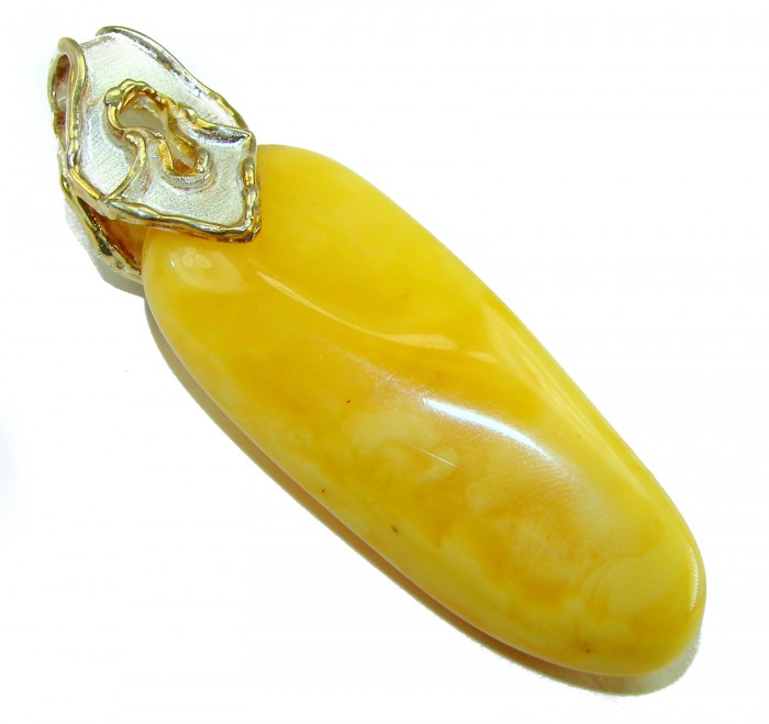 Sea Treasure Prehistoric Authentic Butterscotch Baltic Amber 2 tones .925 Sterling Silver beautifully handcrafted Huge Pendant - Butterscotch Baltic amber pendant, close-up side view.