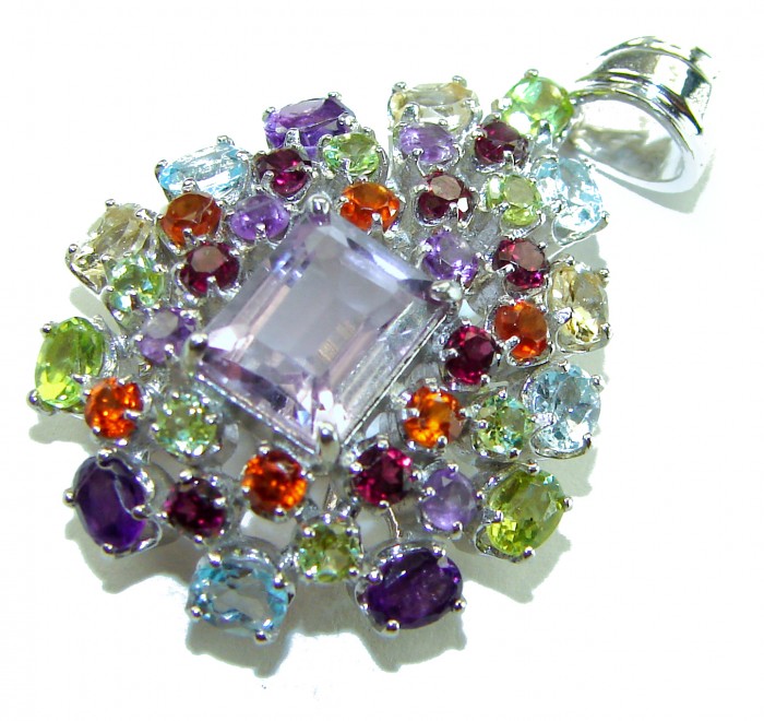 Mademoiselle - 18.4 CARAT authentic Amethyst .925 Sterling Silver handcrafted Pendant - Colorful gemstone pendant with central amethyst, top view.
