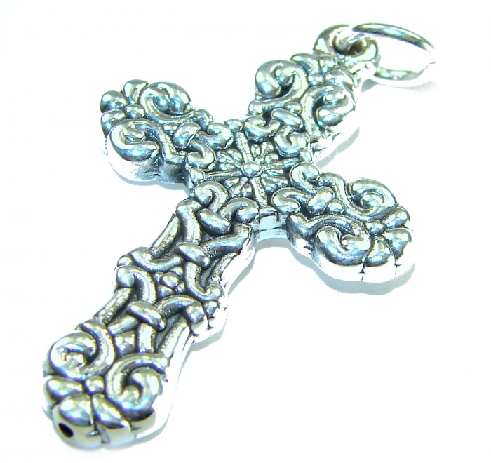Holy Cross the best quality .925 Sterling Silver Bali made Pendant - Intricate sterling silver cross pendant, close-up view.