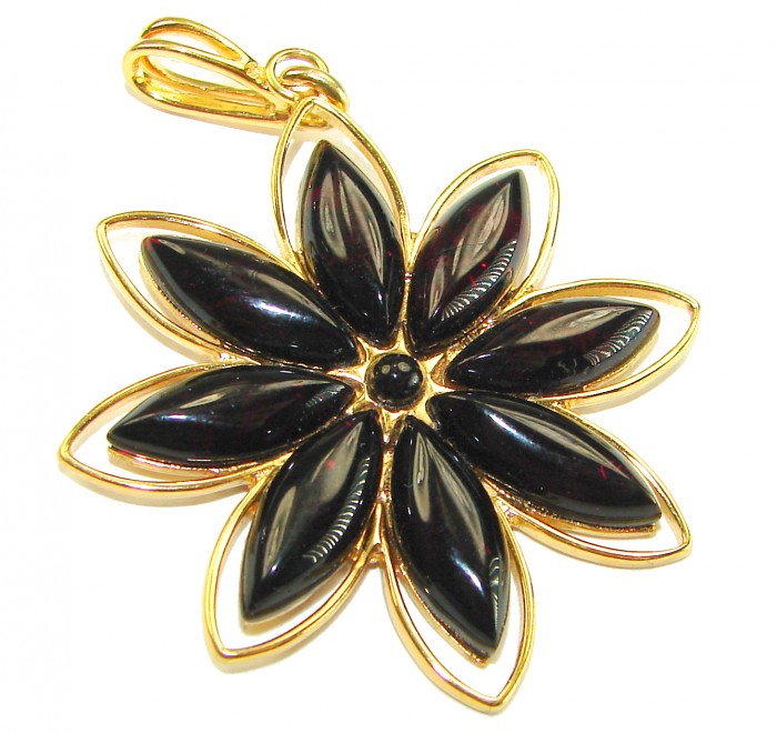 Prehistoric cognac Authentic Baltic Amber 18K Gold over .925 Sterling Silver beautifully handcrafted Pendant - Gold flower pendant with black stones, top view.