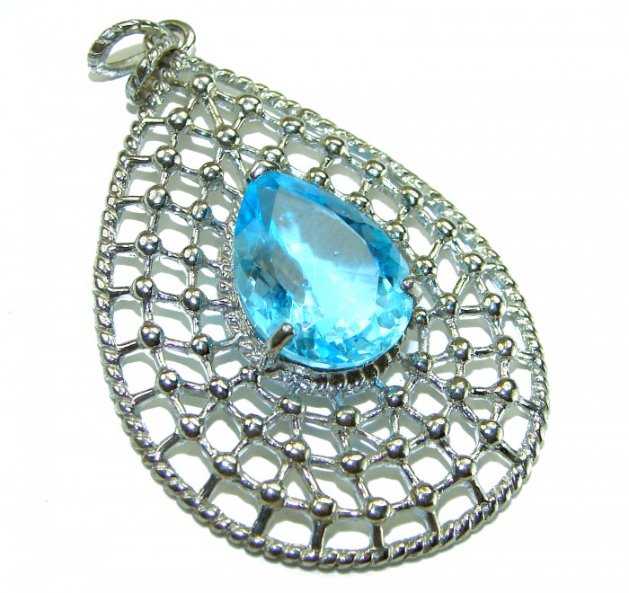 Pacifica 12.5 carat authentic Blue Topaz .925 Sterling Silver Handcrafted pendant - Blue topaz pendant in sterling silver, top view.