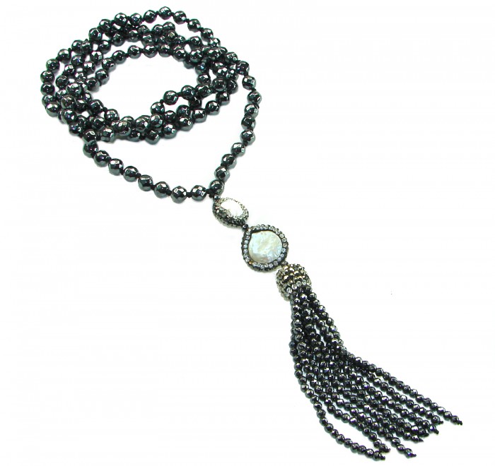 Boho Style Genuine Titanum Crystal .925 Sterling Silver handmade necklace 34 inches long - Boho style necklace with tassel, top view.