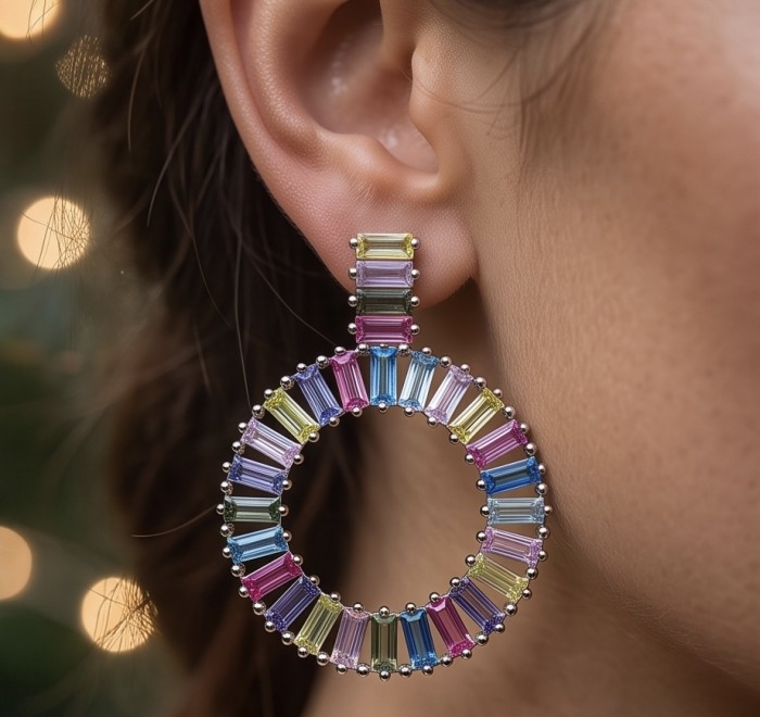 Rainbow authentic 6.5 carat Topaz rhodium over .925 Sterling Silver handcrafted Statement Earrings - Close-up of rainbow topaz hoop earring worn on ear