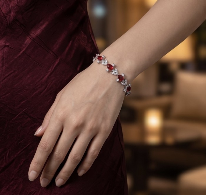 Crimson Fire 5.2 carat Ruby .925 Sterling Silver .925 Sterling Silver Statement Bracelet - Ruby bracelet on hand, showcasing design and stones.