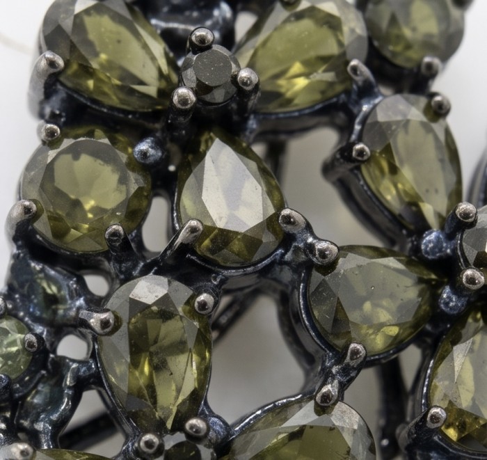 Mystery Rare 12.5 carat Grandidierite black rhodium over .925 Sterling Silver Handcrafted pendant - Grandidierite gemstones close-up with black rhodium setting.