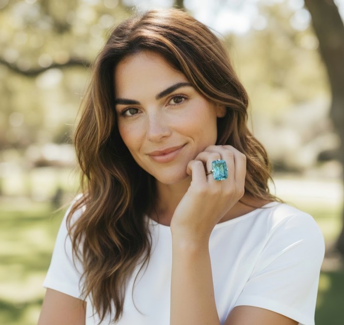 Oceania baquette cut 22.5 carat Paraiba Tourmaline 2 tones .925 Sterling Silver Handcrafted Ring size 8 - Woman wearing Oceania 22.5 carat Paraiba Tourmaline ring on hand.