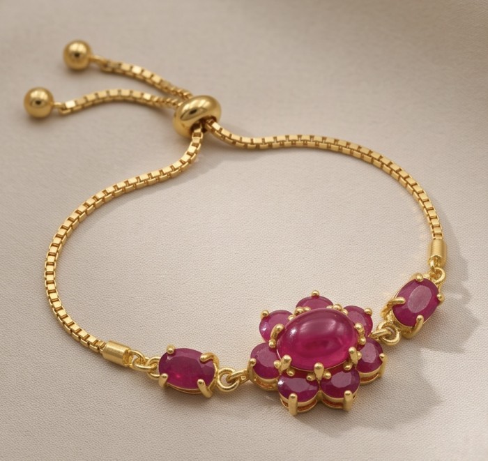 Bella Rosa - 29.4 carat authentic Mozambique Ruby .925 Sterling Silver dipped in 22K Gold handcrafted Bracelet - Top view of Bella Rosa Mozambique Ruby bracelet with gold chain detailing.