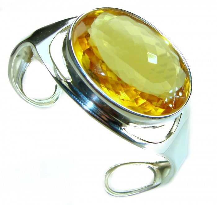 Simplicity 81.5 carat Genuine Lemon Quartz handcrafted .925 Sterling Silver Bracelet / Cuff - Close-up of 81.5-carat lemon quartz bracelet with silver band.