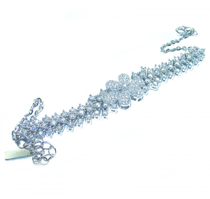 Natural 32.5 carat White Topaz .925 Sterling Silver handmade Statement Bracelet - Topaz sterling silver bracelet, angled side view showing floral design.