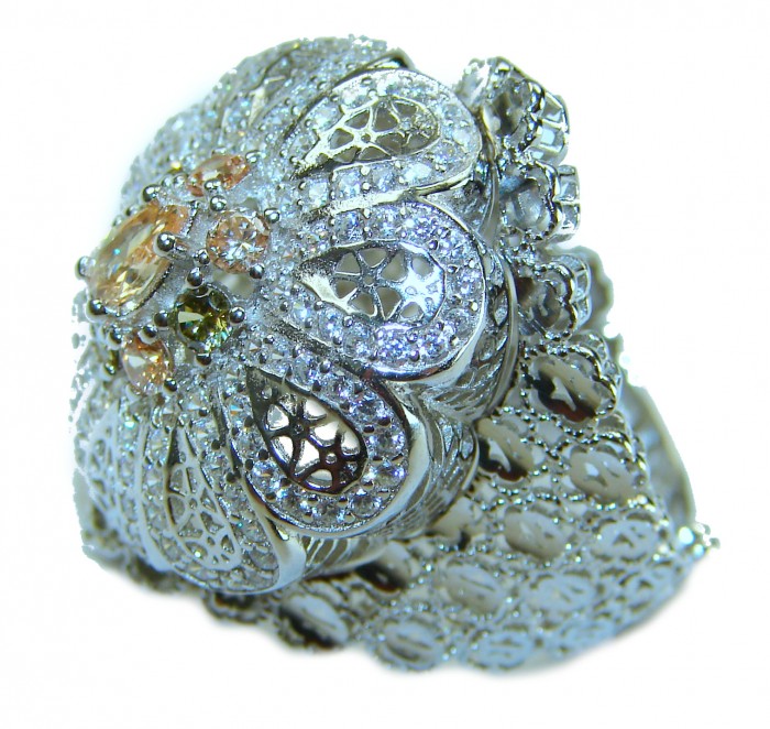 Casablanca Italy made 1.8 carat yellow Sapphire .925 Sterling Silver brilliantly handcrafted ring s. 6 3/4 - Close-up of intricate silver ring with yellow sapphire detailing.