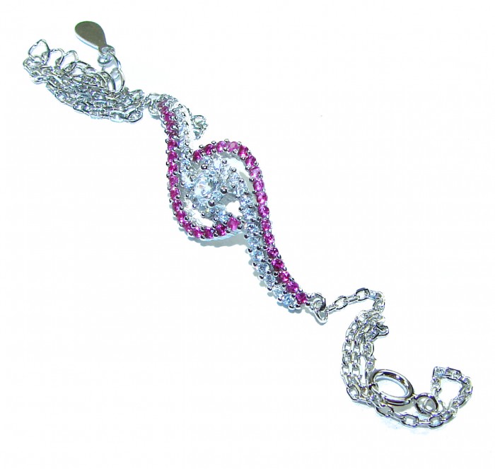 7.5 carat Ruby .925 Sterling Silver handmade Statement Bracelet - Ruby and silver bracelet, angled view, showcasing clasp and chain details.