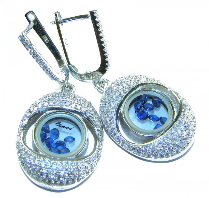 Floating Memories 8.5 carat Sapphire .925 Sterling Silver Handcrafted Statement earrings - Sterling silver earrings with floating sapphires, front angle view.