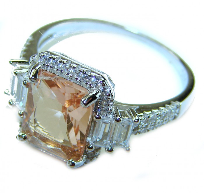 Authentic emerald cut 8.2 carat volcanic Morganite .925 Sterling Silver ring s. 9 - Side view of 8.2 carat volcanic Morganite ring with diamond accents.