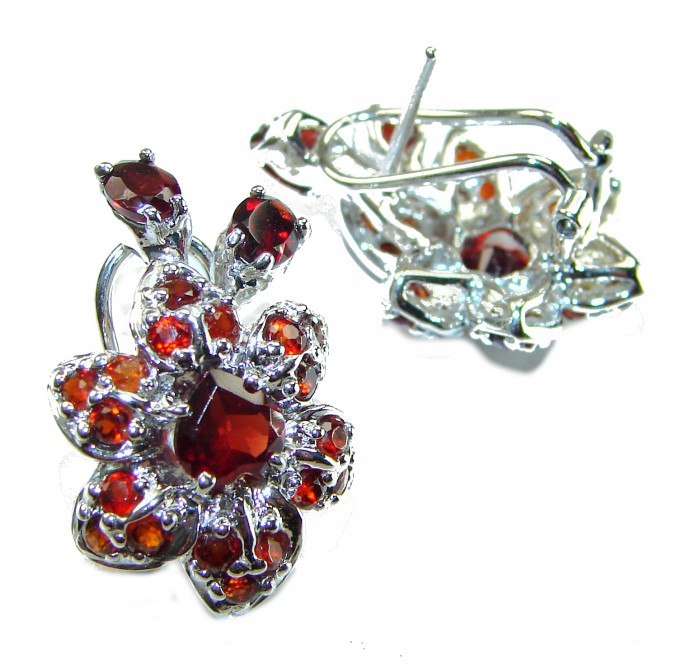 Penelope Authentic 22.5 carat faceted Garnet .925 Sterling Silver handcrafted earrings - Close-up of Penelope Garnet Earrings, flower design, sterling silver.