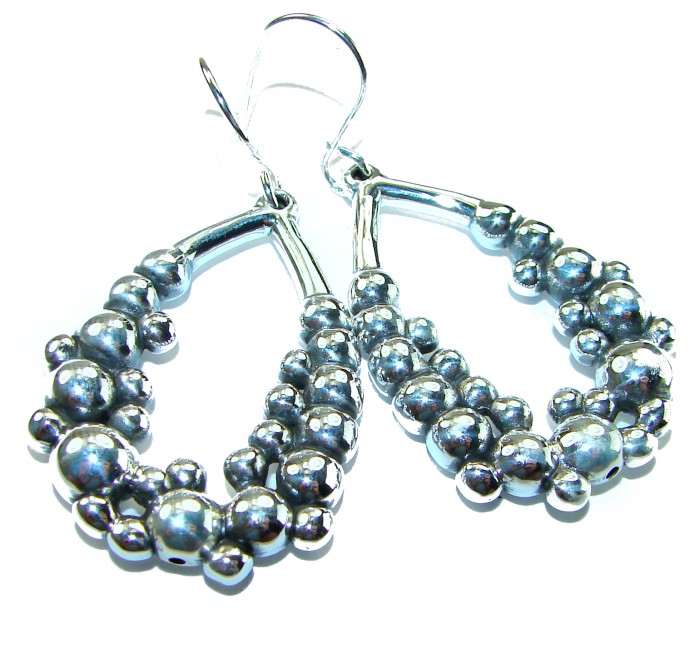 Fancy .925 Sterling Silver Italy made Earrings - Close-up of fancy .925 sterling silver Italian earrings with bead details.