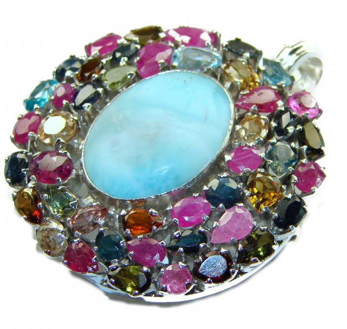 One of a kind Genuine 38.5 carat Larimar Tourmaline .925 Sterling Silver handmade Pendant - Brooch - Close-up of a colorful gemstone pendant with a blue larimar centerpiece.