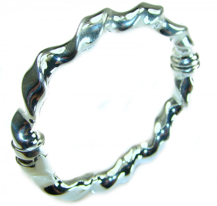Precious Italy made Authentic .925 Sterling Silver handmade Bracelet - Wavy sterling silver ring, close-up top view.