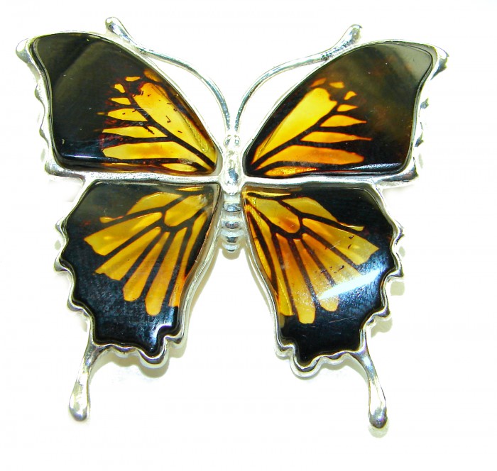Large Golden Butterfly carved Baltic Polish Amber .925 Sterling Silver handcrafted Pendant / Brooch - Front view of large golden butterfly amber brooch in silver setting