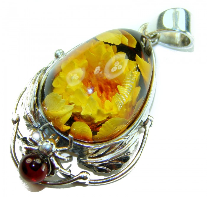 REAL ART! SUMMER Wild Sunflowers Fabulous - carved GENUINE Baltic Amber Sterling Silver handmade Pendant - Amber sunflower pendant with silver spider detail, close-up view.