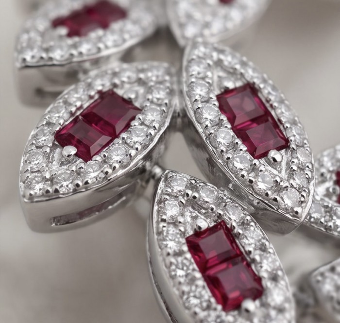 Precious - Art Deco 10.2 carat Ruby .925 Sterling Silver handmade earrings - Close-up of Art Deco ruby and silver jewelry with diamond accents.