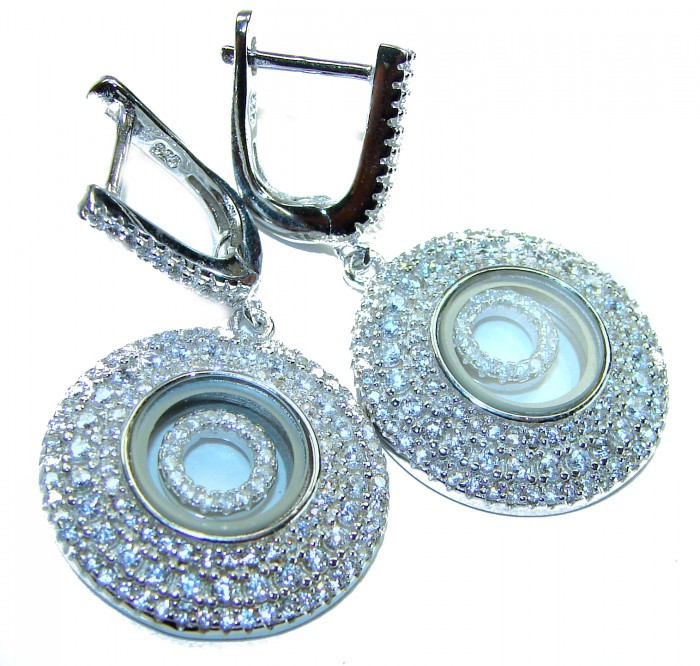Floating Memories 4.5 carat White Sapphire .925 Sterling Silver Handcrafted earrings - Close-up of floating sapphire earrings with sterling silver clasp detail
