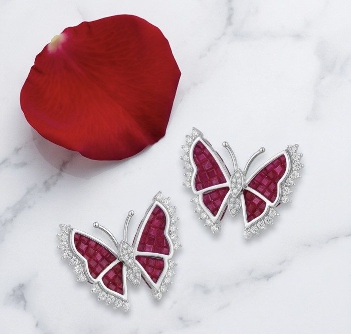 Real Beauty natural 11.9 carat mystery setting Ruby Butterflies .925 Sterling Silver handcrafted earrings - Butterfly ruby earrings with diamond accents on marble background.