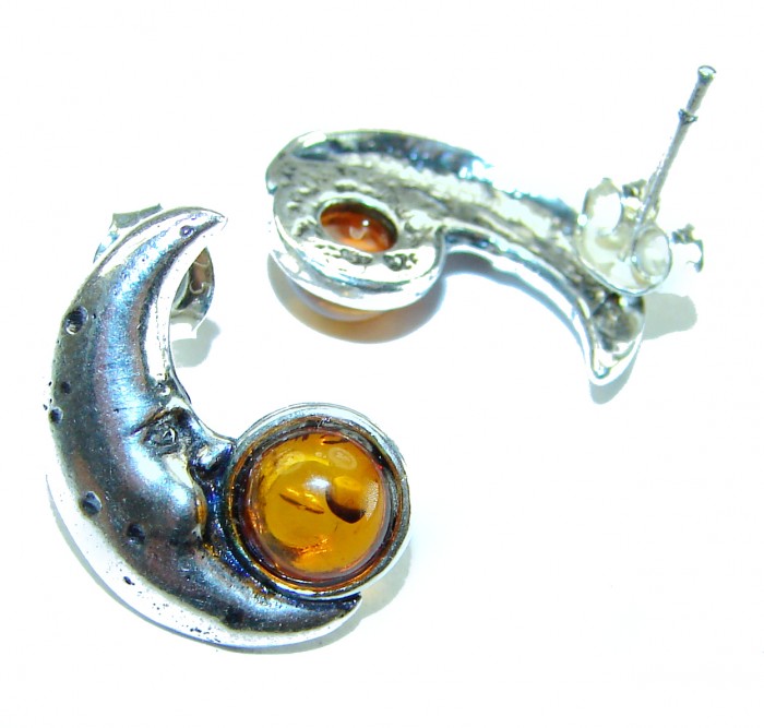 Magic MOON Baltic Polish Amber .925 Sterling Silver Earrings - Earrings close-up showing amber and crescent moon detail.